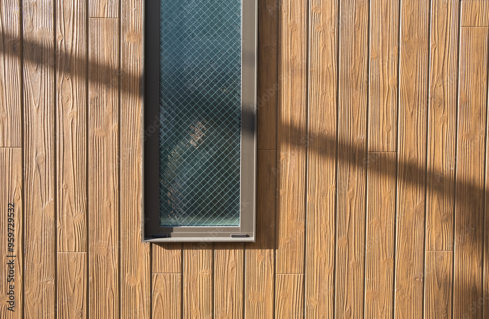 Window with wooden building wall