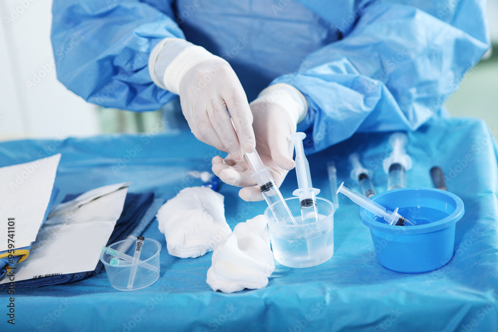 Surgical interventions on blood vessels. The work of a surgeon's assistant during surgery. Endovascular surgery. Removal of blood clots. Surgical interventions on blood vessels. The work of a surgeon's assistant during surgery. Endovascular surgery. Removal of blood clots.
