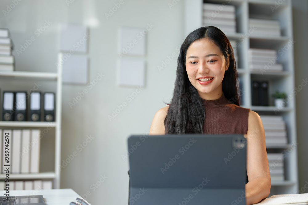 Asian woman, office worker working in the office Happy working with laptop at desk doing business in finance, accounting, online marketing. Online working concept.