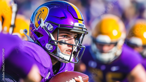 A determined quarterback focuses downfield, preparing for next play with intensity and concentration. photo