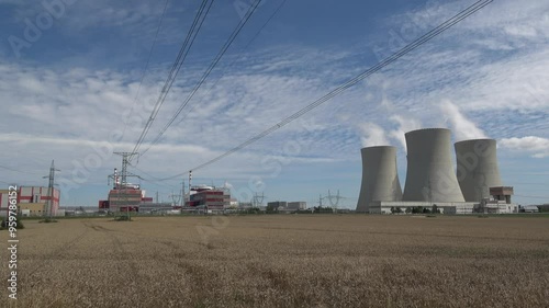 Nuclear power plant Temelin in hot summer weather. South bohemia in Czech republic, European union. Large nuclear power station proucing electricity.