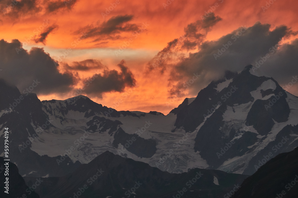 Sunset at the Espace San Bernardo ski resort in the Italian Alps of the Aosta Valley. Sunset at the Espace San Bernardo ski resort in the Italian Alps of the Aosta Valley.