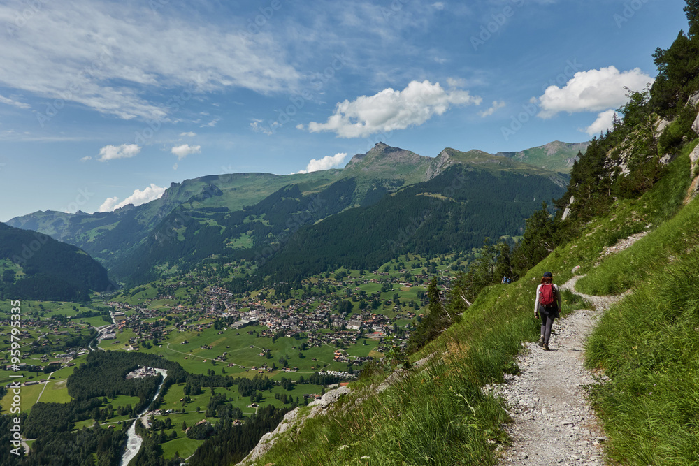 Hiking to the Gletscherschlucht glacier in Grindelwald, with imposing canyons, waterfalls and panoramic views of the valley. Swiss Alps Hiking to the Gletscherschlucht glacier in Grindelwald, with imposing canyons, waterfalls and panoramic views of the valley. Swiss Alps