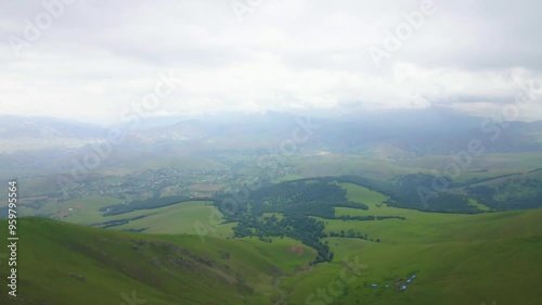 Drone shot descending in the caucasus mountains in the Gadabay District in Azerbaijan. photo