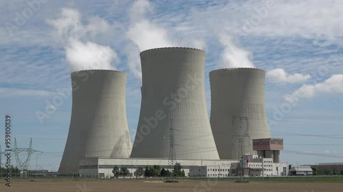 Nuclear power plant Temelin in hot summer weather. South bohemia in Czech republic, European union. Large nuclear power station proucing electricity.