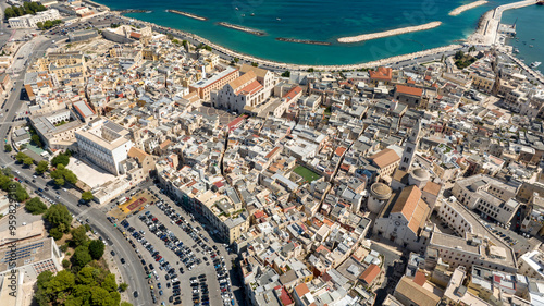 Aerial view of the Basilica of Saint Sabinus and Pontifical Basilica of Saint Nicholas located in Bari, Puglia, Italy. They're located in the historic center of the city called Old Bari, near seaside. photo