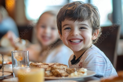 Happy irish american kid and his sister enjoying in buffet breakfast while being in hotel with their parents