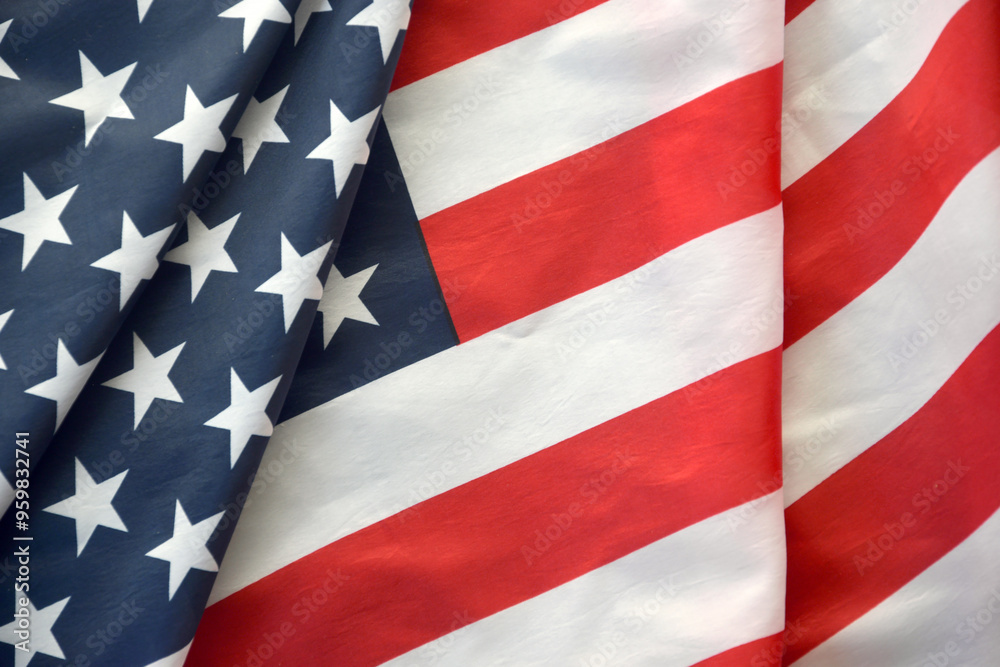 Fototapeta premium United States of America flag with stars and stripes close up. Official US Banner waving with folds