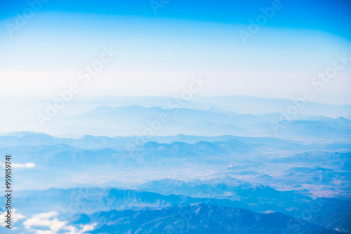 A view of the planet Earth, a view from an airplane, mountains and clouds