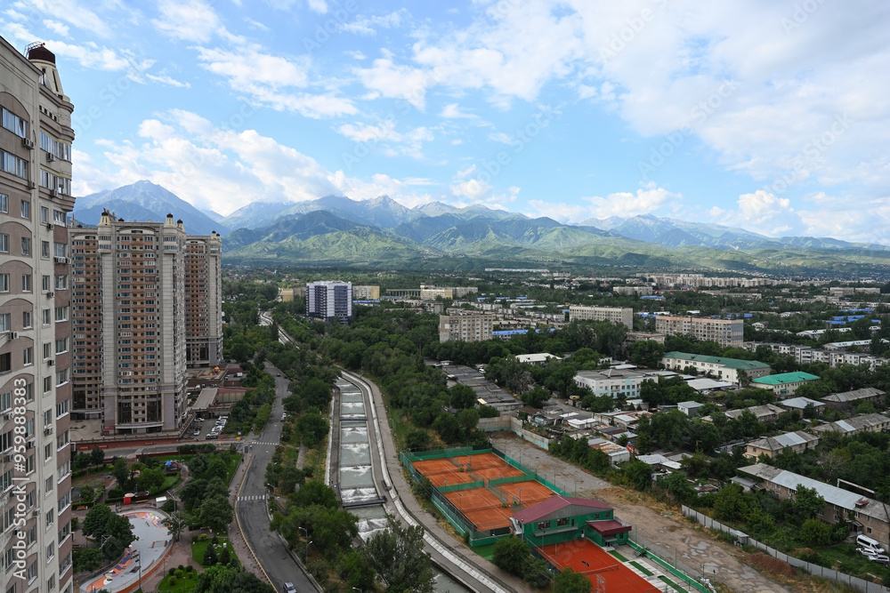 Fototapeta premium Almaty city and the Tien Shan Mountains on a summer day, Kazakhstan.