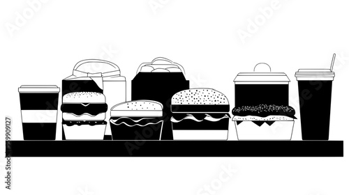 Display of boxed lunches neatly arranged on a table, each containing a sandwich, side, and drink