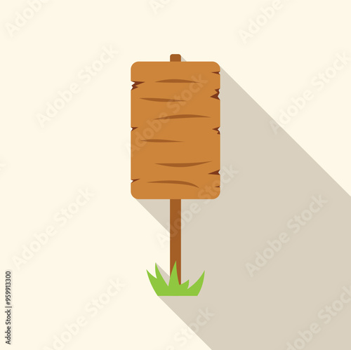 Blank wooden sign standing on grass casting a long shadow over a light background, perfect for adding your own text or message