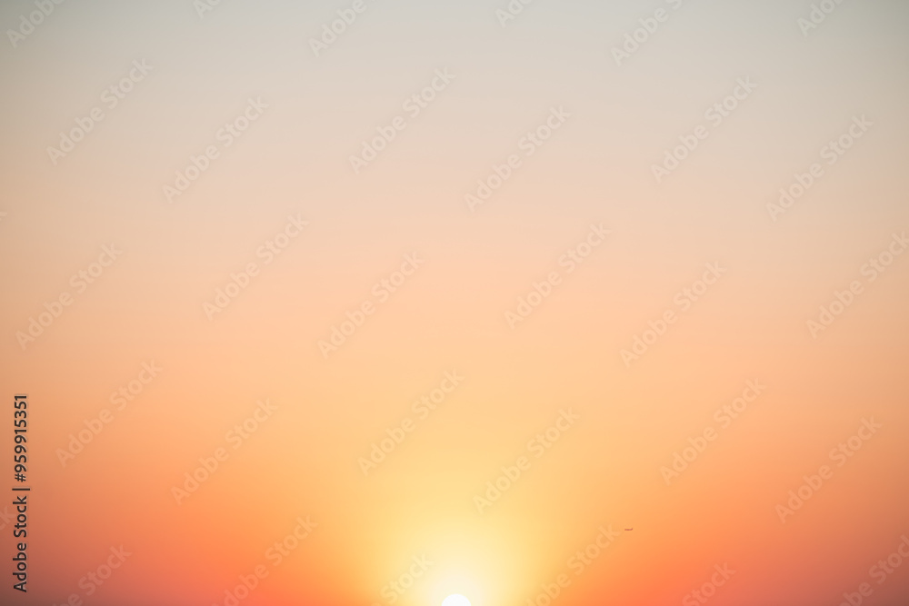 Naklejka premium Natural delicate background, sky at sunrise, color gradient from yellow to orange, delicate and smooth transition