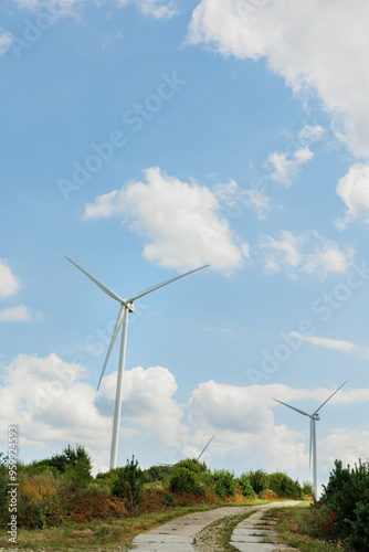 electricity production, Wind Turbine, windmill farm, turbines generating electricity, green electricity, clean energy, Innovative, sunny day,