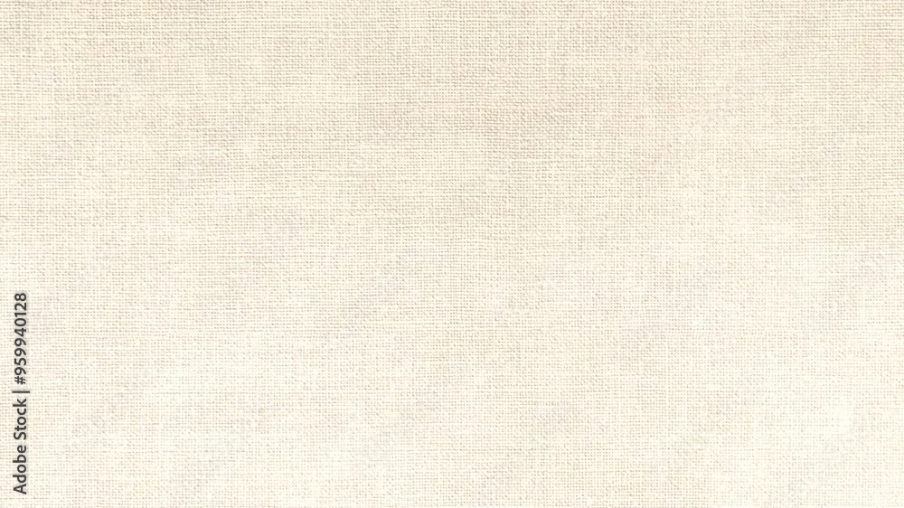 video footage of the surface texture fibers of a cream white cotton cloth moving slowly