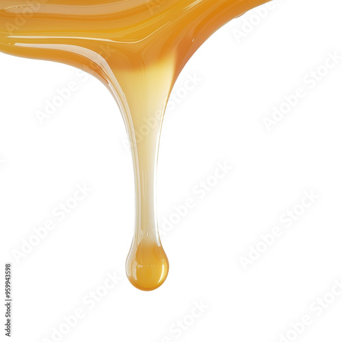 A drop of honey drips down a spoon