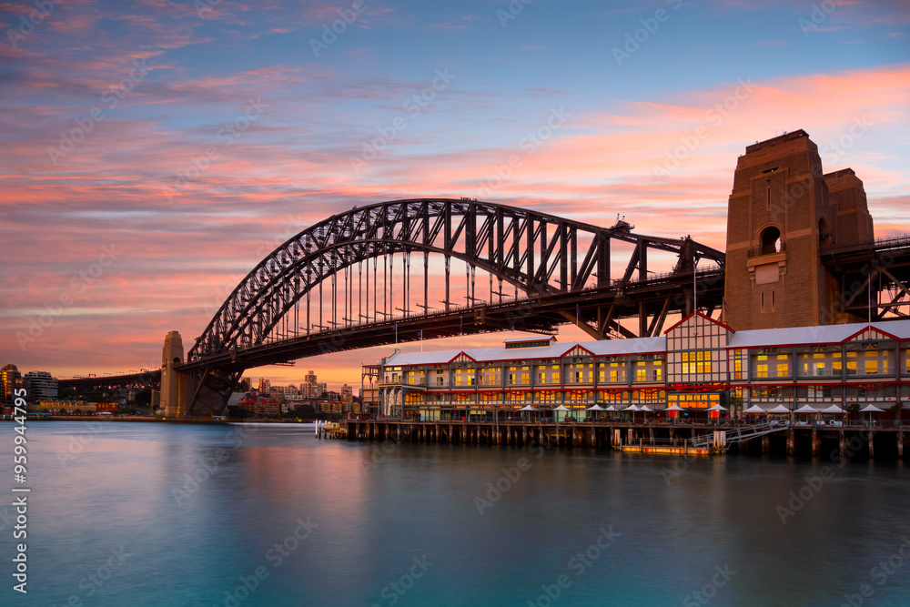 Naklejka premium The Scenery of Sydney Harbor Bridge at Sunset