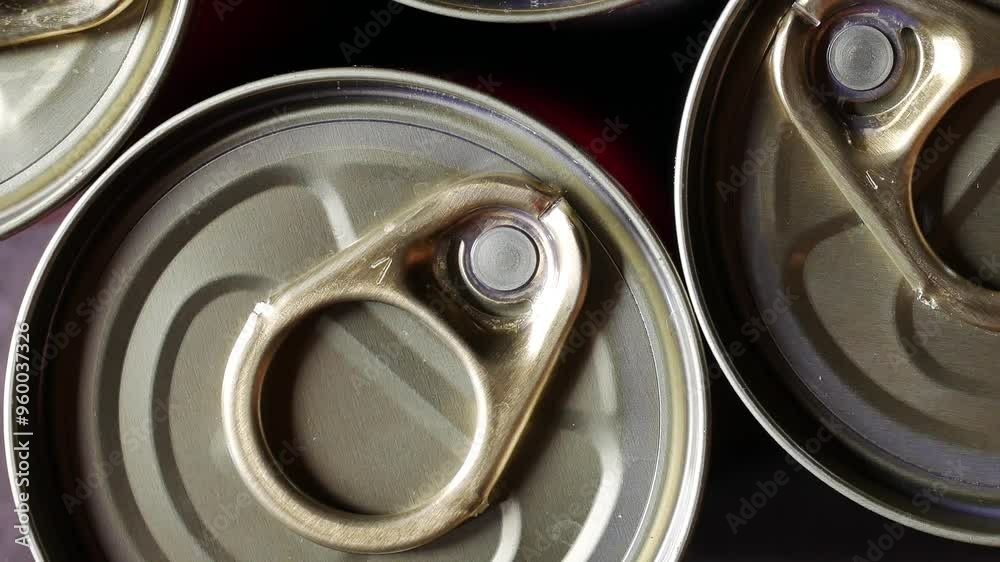 Close-up of Aluminum can lid ring that holds food. macro, top view
