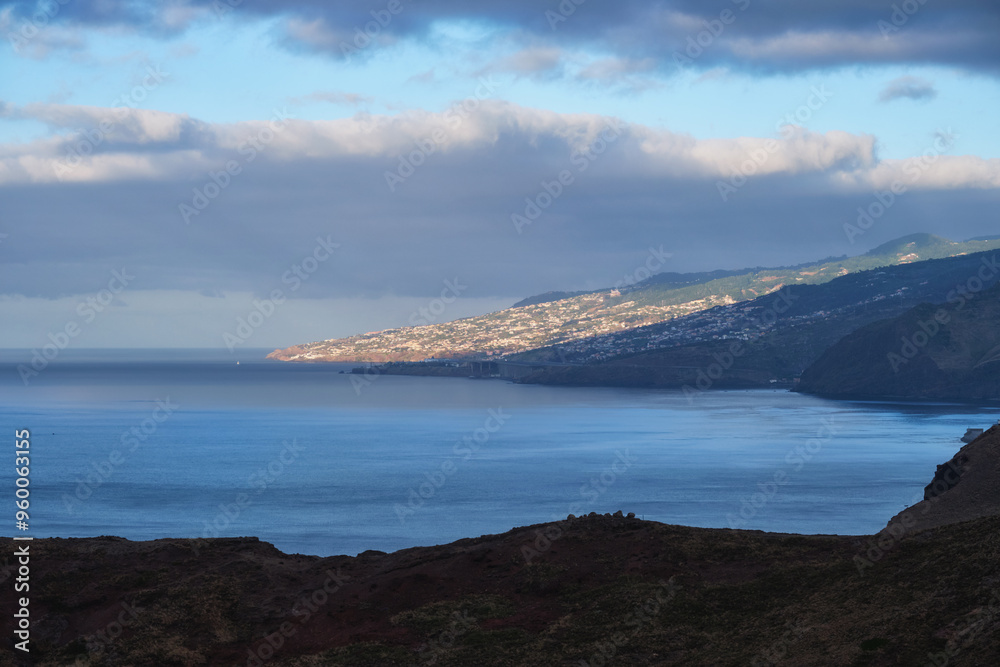 View of Funchal city and Madeira airport in the morning. Madeira, Portugal View of Funchal city and Madeira airport in the morning. Madeira, Portugal
