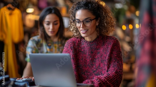 Women Working Together on a Laptop