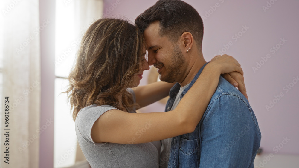 Woman and man embracing in a living room, expressing love and intimacy, showcasing a beautiful relationship between a couple at home Woman and man embracing in a living room, expressing love and intimacy, showcasing a beautiful relationship between a couple at home