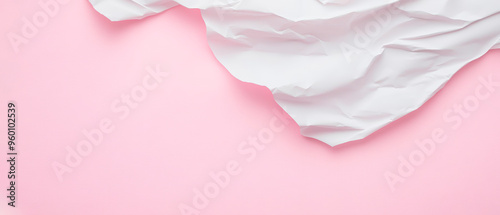 A contrast between crumpled white paper and a smooth pink surface. The white paper, with its various folds and creases, occupies the upper left portion. Generative AI 