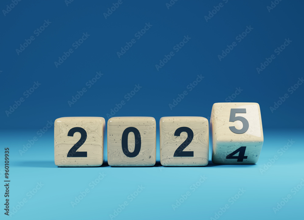 Flipping wooden cubes with the Year number 2024 and 2025, New Year concept Flipping wooden cubes with the Year number 2024 and 2025, New Year concept