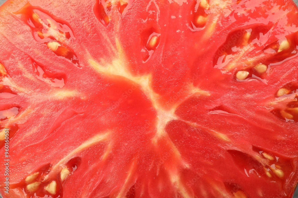 Cut ripe red tomato as background, top view Cut ripe red tomato as background, top view
