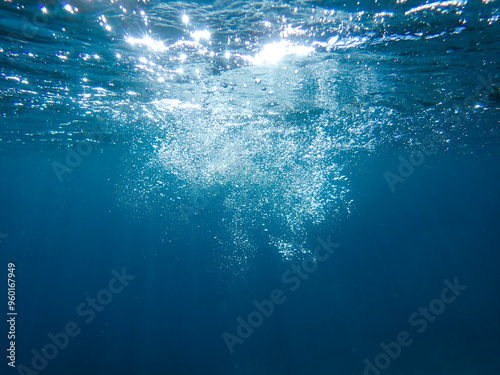 Bubbles under the sea in the crystal clear green sea water. Mediterranean bubbles. Real image very suitable for backgrounds, Rising Bubbles in Deep Underwater, Under with bubble. Great for background.