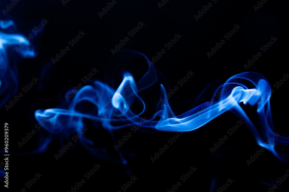 Illustration of blue beautiful smoke on the black background Illustration of blue beautiful smoke on the black background