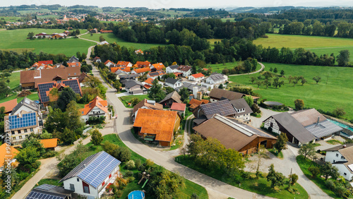 Aerial View of Village Rooftops and Farm in Germany with Solar Panels