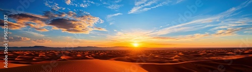 Panoramic view of a stunning desert sunset with a colorful sky and endless sand dunes. The serene landscape offers a feeling of tranquility and wonder.