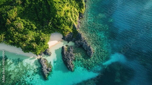 Aerial shot capturing the lush greenery and clear waters of the Mamanuca Islands.