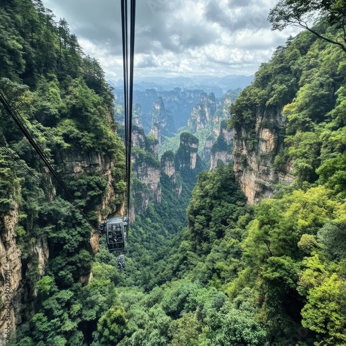 The panoramic view from the top of the Bailong Elevator in Zhangjiajie, looking down on the lush forest and towering cliffs. photo