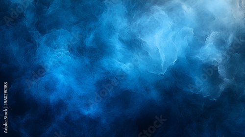 Abstract blue smoke swirling gracefully in dark space creates an ethereal atmosphere and captivating visual depth