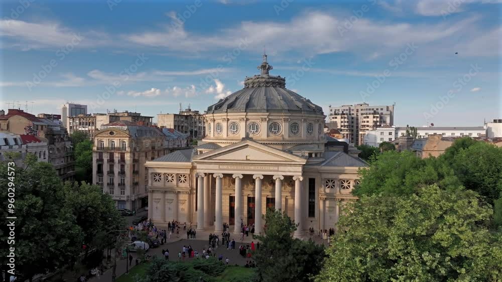 Bucharest In Summer Romanian Atheneum in Bucharest during a summer sunset. Aerial 4k video ...