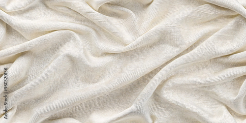 Depicts soft, off-white fabric draped in gentle folds, displaying a delicate texture with a subtle weave pattern, creating an elegant and serene look