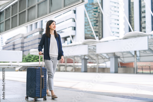 Photography Adult business asian woman walking with luggage for work and travel at station p