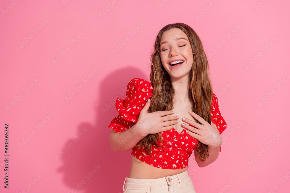 Photo portrait of lovely teen lady laugh have fun dressed stylish red garment isolated on pink color background