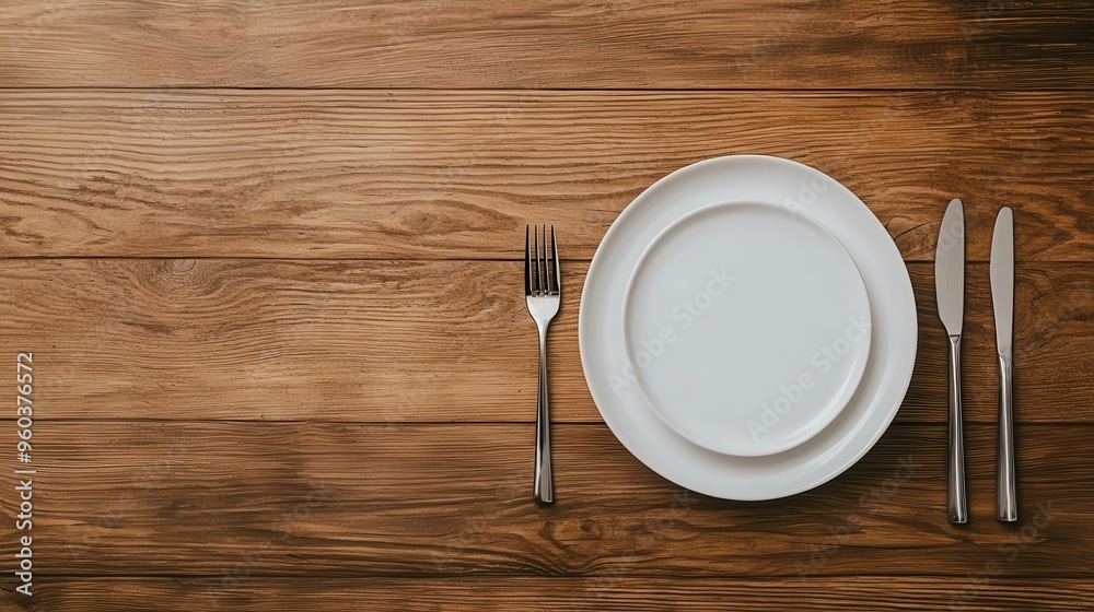Overhead shot of a minimalist dining table, soft ambient lighting, subtle shadows on the tableware, Realism, Warm palette Overhead shot of a minimalist dining table, soft ambient lighting, subtle shadows on the tableware, Realism, Warm palette
