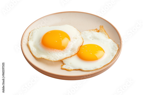 Crisp and clean two sunny side up fried eggs on round plate isolated on transparent background
