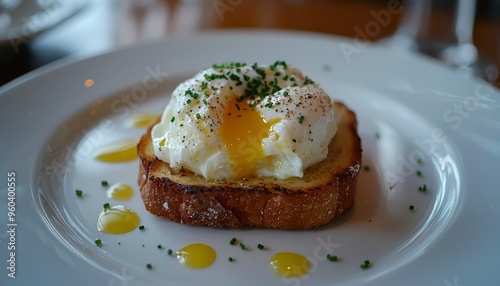 Poached Egg on Toast with Chives and Pepper photo