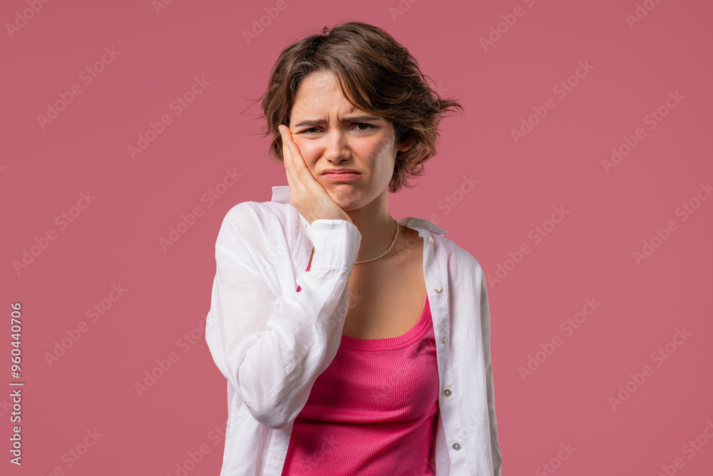 Young pretty woman with tooth pain, pink background. Toothache, dental problem Young pretty woman with tooth pain, pink background. Toothache, dental problem