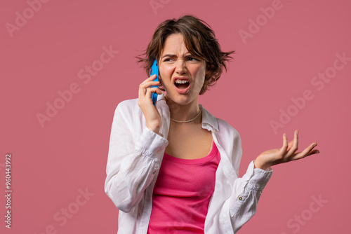 Wallpaper Mural Annoyed Young Woman Quarreling While Talking On Mobile Phone. Angry Lady Torontodigital.ca