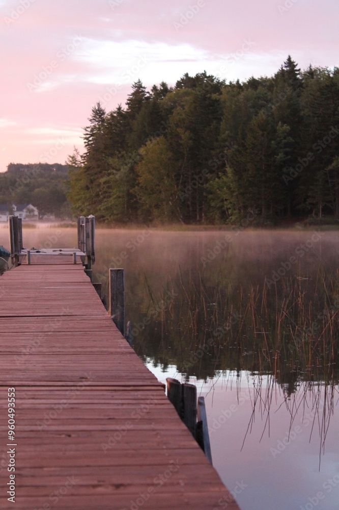 Obraz premium dock in the lake at sunrise