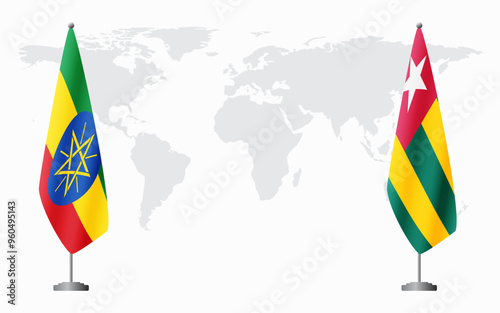 Ethiopia and Togo flags for official meeting against background of world map.