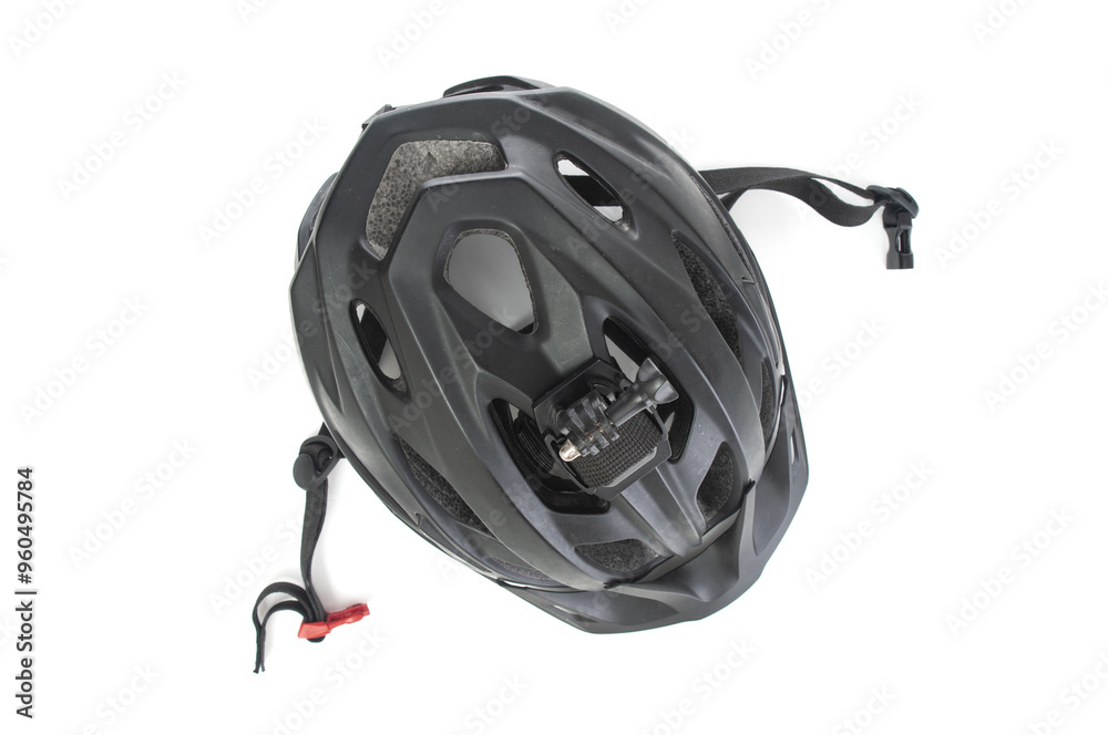 Fototapeta premium Old, dusty bicycle helmet isolated on white background