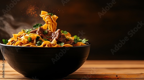 A bowl of Lanzhoustyle handpulled noodles with clear broth, tender beef slices, and fresh cilantro, served on a rustic wooden table photo