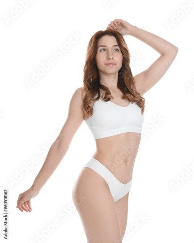 Woman with slim body posing on white background