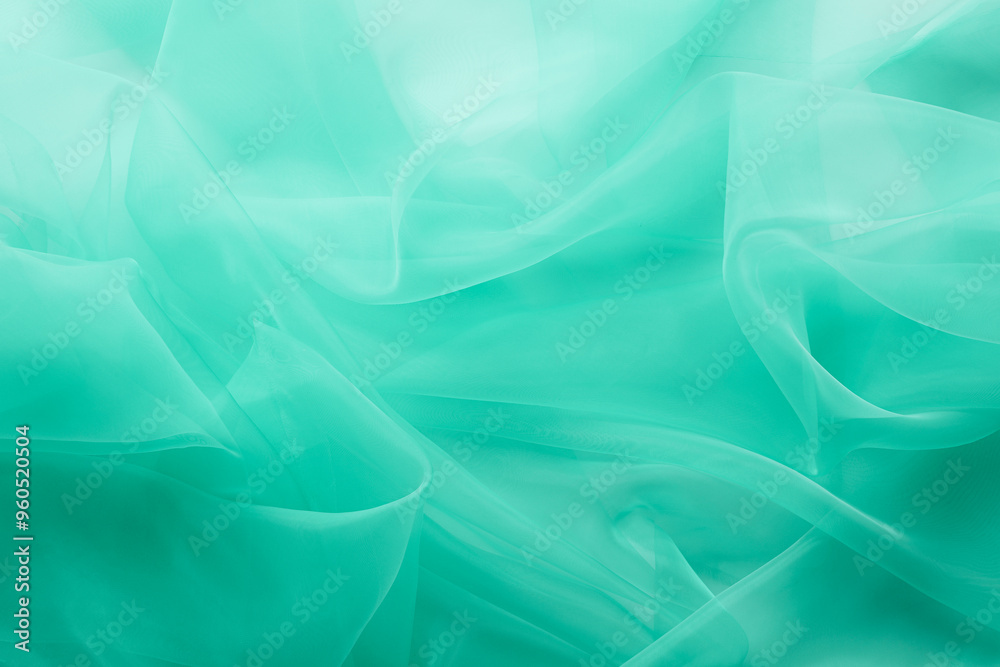 Beautiful turquoise color tulle, closeup view of fabric Beautiful turquoise color tulle, closeup view of fabric